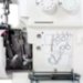 Оверлок Janome 210D